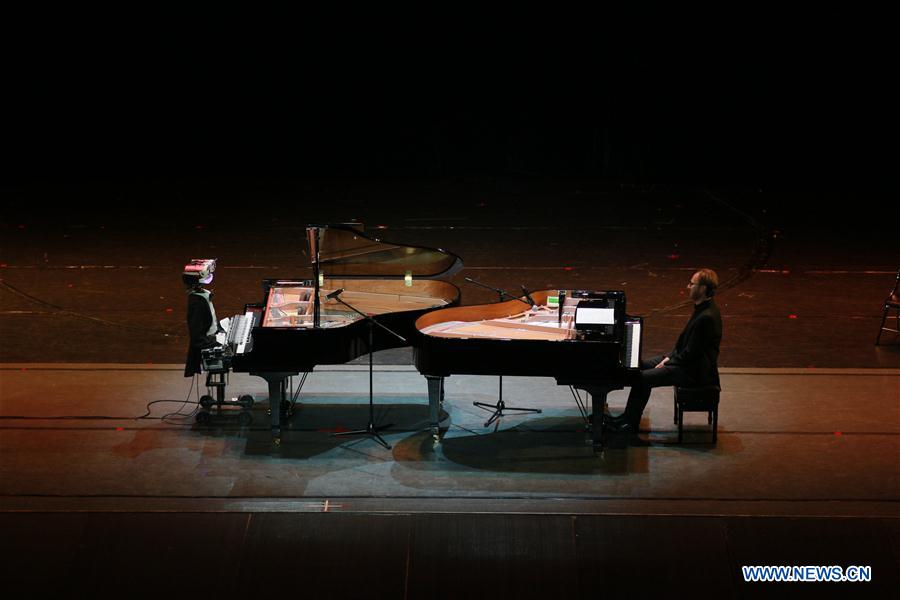 PHOTOS: 53-Fingered Robot Plays Duet with Italian Pianist in Tianjin –  Thatsmags.com